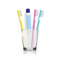 Toothbrush, toothpaste in a glass Royalty Free Stock Photo