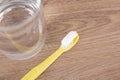 Toothbrush with toothpaste and a glass of water Royalty Free Stock Photo