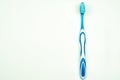Toothbrush with toothpaste isolated on a white background top view Royalty Free Stock Photo