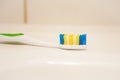 Toothbrush on the washsink in the bathroom Royalty Free Stock Photo