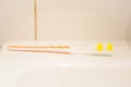 Toothbrush on the washsink in the bathroom Royalty Free Stock Photo