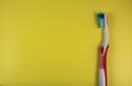 Toothbrush on a yellow background in the style of pop art Royalty Free Stock Photo