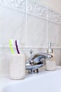 Toothbrushes in a clean white bathroom Royalty Free Stock Photo