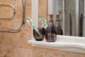 Toothbrushes colored in a black glass Royalty Free Stock Photo