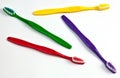 Four colourful toothbrushes. Royalty Free Stock Photo