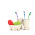 Toothbrushes and glycerin soap isolated on a white background