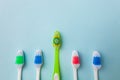 Toothbrushes on light blue background, close up different kinds of Toothbrushes, new not used, isolated for text insertion, one of Royalty Free Stock Photo