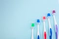 Toothbrushes on light blue background, close up different kinds of Toothbrushes, new not used, isolated for text insertion Royalty Free Stock Photo