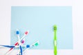 Toothbrushes on light blue background, close up different kinds of Toothbrushes, new not used, isolated for text insertion, one of Royalty Free Stock Photo