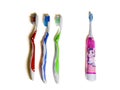 Toothbrushes in red blue green and pink