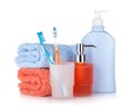 Toothbrushes, shampoo bottles and two towels Royalty Free Stock Photo