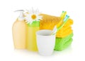 Toothbrushes, shampoo bottles, two towels and flowe Royalty Free Stock Photo