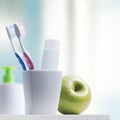 Toothbrushes and toothpaste in the bathroom