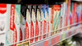Toothbrushes and toothpaste are on the shelves of stores. Royalty Free Stock Photo