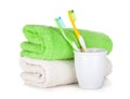 Toothbrushes and two towels Royalty Free Stock Photo