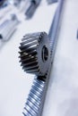 Spur gear rack and pinion. Toothed gear on a toothed shaft Royalty Free Stock Photo