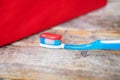 Toothpaste being squeezed onto a toothbrush Royalty Free Stock Photo