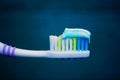 Toothbrush with toothpaste on a green background Royalty Free Stock Photo