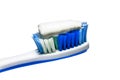 Toothpaste on the toothbrush isolated on white background Royalty Free Stock Photo