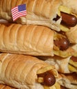 Toothpick with the American flag on top of many hotdogs Royalty Free Stock Photo