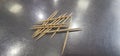 Toothpick wood on milenium table Royalty Free Stock Photo