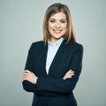 Toothy smiling Business woman crossed arms isolated portrait.