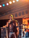 Toots of Toots and the Maytals sing into mic on stage at the Ma Royalty Free Stock Photo