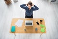 Top above high angle view of attractive desperate devastated girl sitting in chair expressing rage at work place station