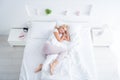 Top above high angle view of her she nice attractive healthy dreamy aged woman lying in bed sleeping in silence spending Royalty Free Stock Photo