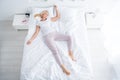 Top above high angle view of her she nice attractive slim fit aged woman lying in bed sleeping in silence spending day Royalty Free Stock Photo