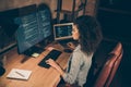 Top above high angle view photo of concentrated afro american girl sit evening table desk work server framework website Royalty Free Stock Photo