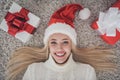 Top above high angle view photo of young cheerful girl happy positive smile lying floor present box holiday indoors Royalty Free Stock Photo