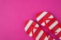 Top above overhead view photo of a pair of flipflops isolated on pink background