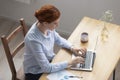 Top above view young female working on computer Royalty Free Stock Photo