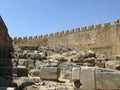 Top of the Acropolis of Lindos, the ancient Hellenistic wall and the ruins of the temple