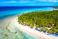 Top aerial drone view of beautiful beach with turquoise sea water, boats and palm trees. Saona island, Dominican republic. Royalty Free Stock Photo