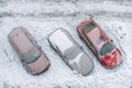 Top aerial view of apartment office building parking lot with many cars covered by snow stucked after heavy blizzard Royalty Free Stock Photo