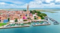 Aerial view of colorful Burano island in Venetian lagoon sea from above, Italy Royalty Free Stock Photo