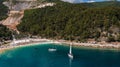 Top aerial view of famous Marble beach ai Thassos island, Greece