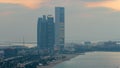 Top view of famous towers buildings in Abu Dhabi day to night timelapse. Royalty Free Stock Photo