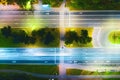 Top aerial view overlook roadway with pedestrian crossing and tree alley night view highlighted by lighting Royalty Free Stock Photo