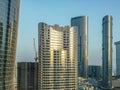 Top aerial view shot of Al Reem island Sun and Sky towers and landmarks in Abu Dhabi city, UAE Royalty Free Stock Photo