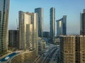 Top aerial view shot of Al Reem island Sun and Sky towers and landmarks in Abu Dhabi city, UAE Royalty Free Stock Photo