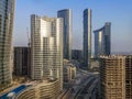 Top aerial view shot of Al Reem island Sun and Sky towers and landmarks in Abu Dhabi city, UAE