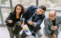 Top, aerial view three female and male Caucasian businesspeople wearing formal suit, meeting strategy plan, working together with Royalty Free Stock Photo