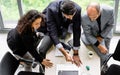 Top, aerial view three female and male Caucasian businesspeople wearing formal suit, meeting strategy plan, working together with Royalty Free Stock Photo