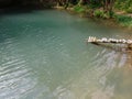 Top Aerial wide view of paradise water glas surface in Deep forest blue lagoon. texture background. Travel tour concept, nature Royalty Free Stock Photo