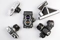 top analog cameras on white background, nikon, canon, olympus, p