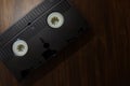 Top angle shot of old Video Cassette on wooden Background. World Day for Audiovisual Heritage