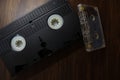 Top angle shot of old Video Cassette on wooden Background. World Day for Audiovisual Heritage